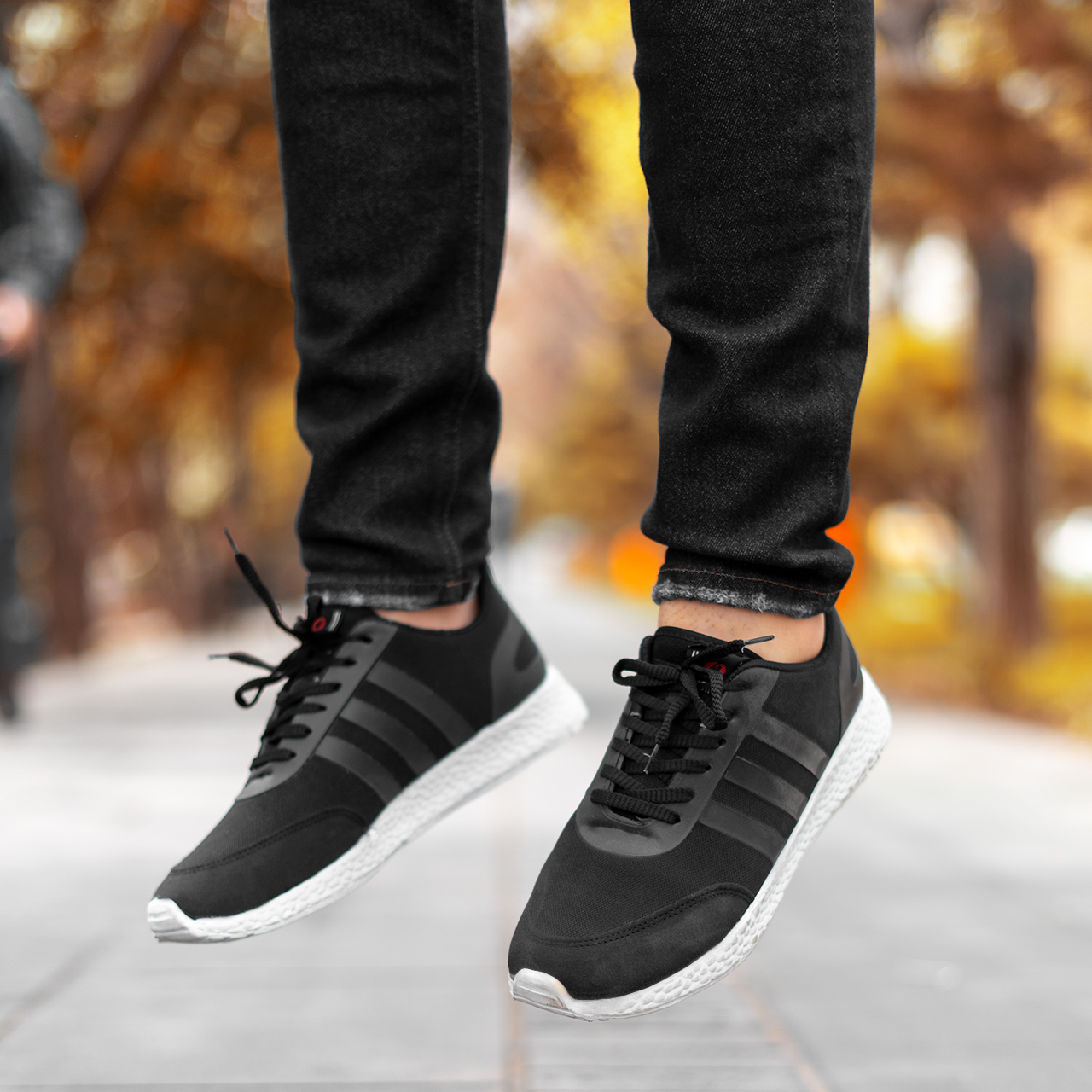 کفش ورزشی آدیداس مردانه مشکی زیره سفید مدل Hami