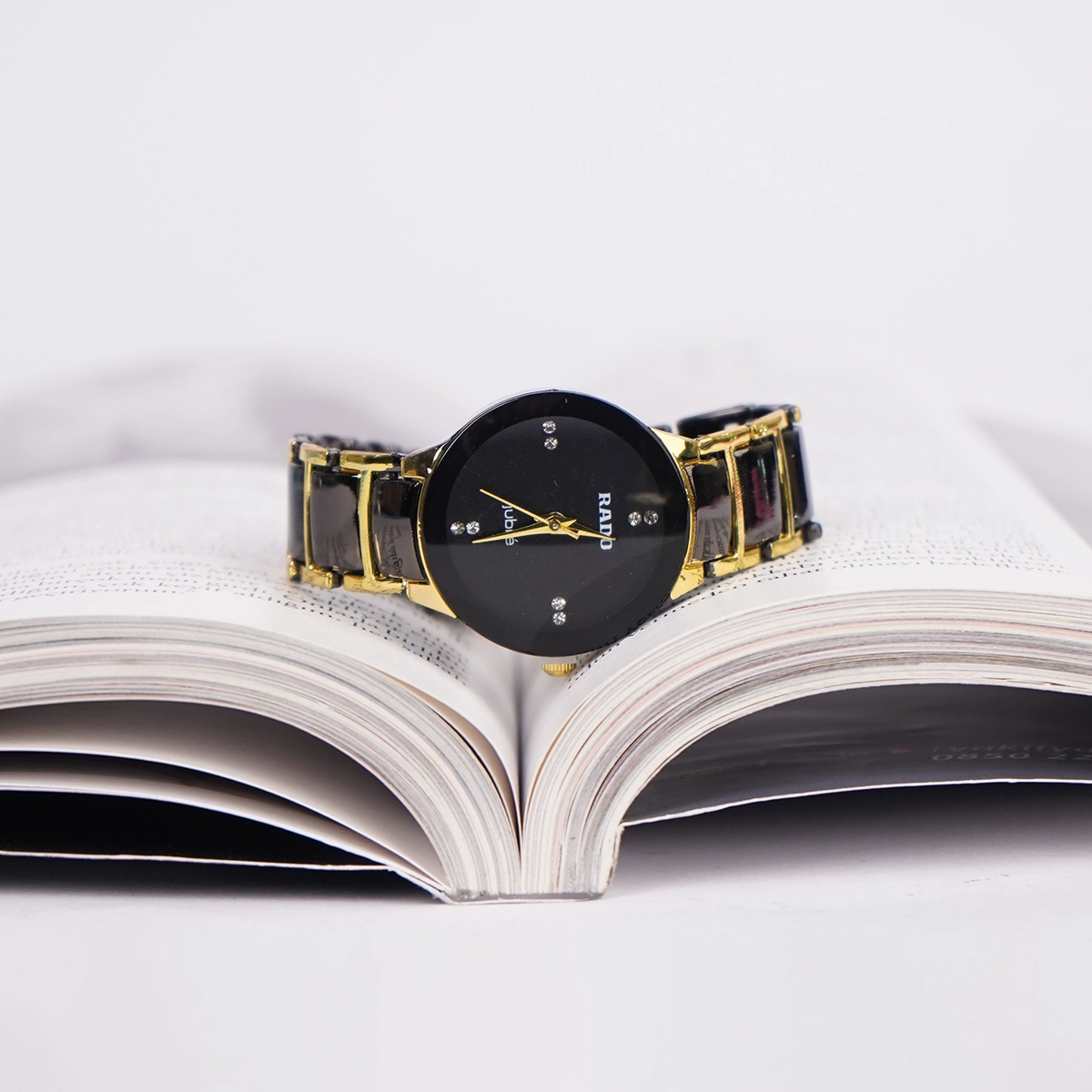 ساعت مشکی طلایی زنانه مدل Rado