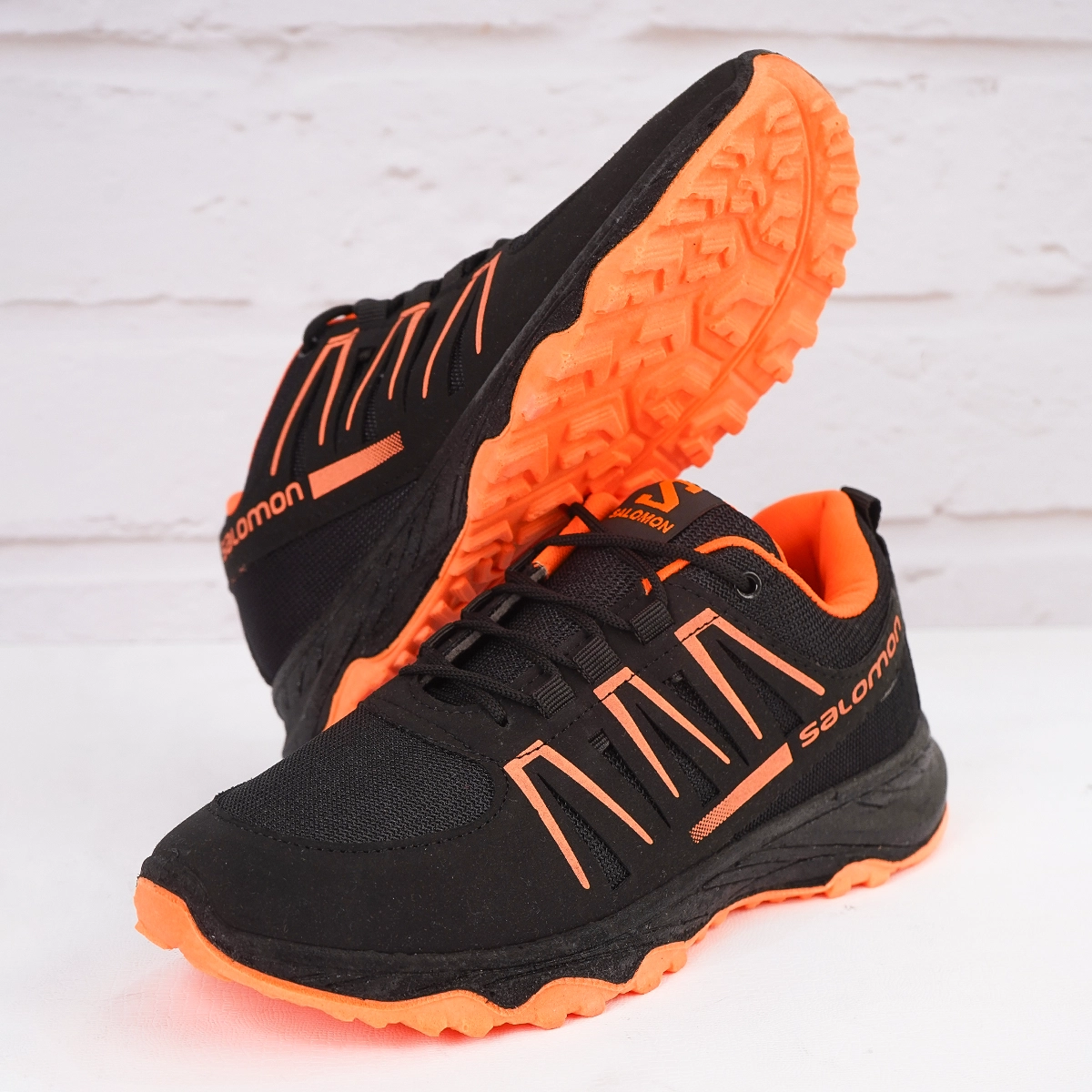کفش ورزشی مردانه مشکی نارنجی Salomon مدل BAHRAM